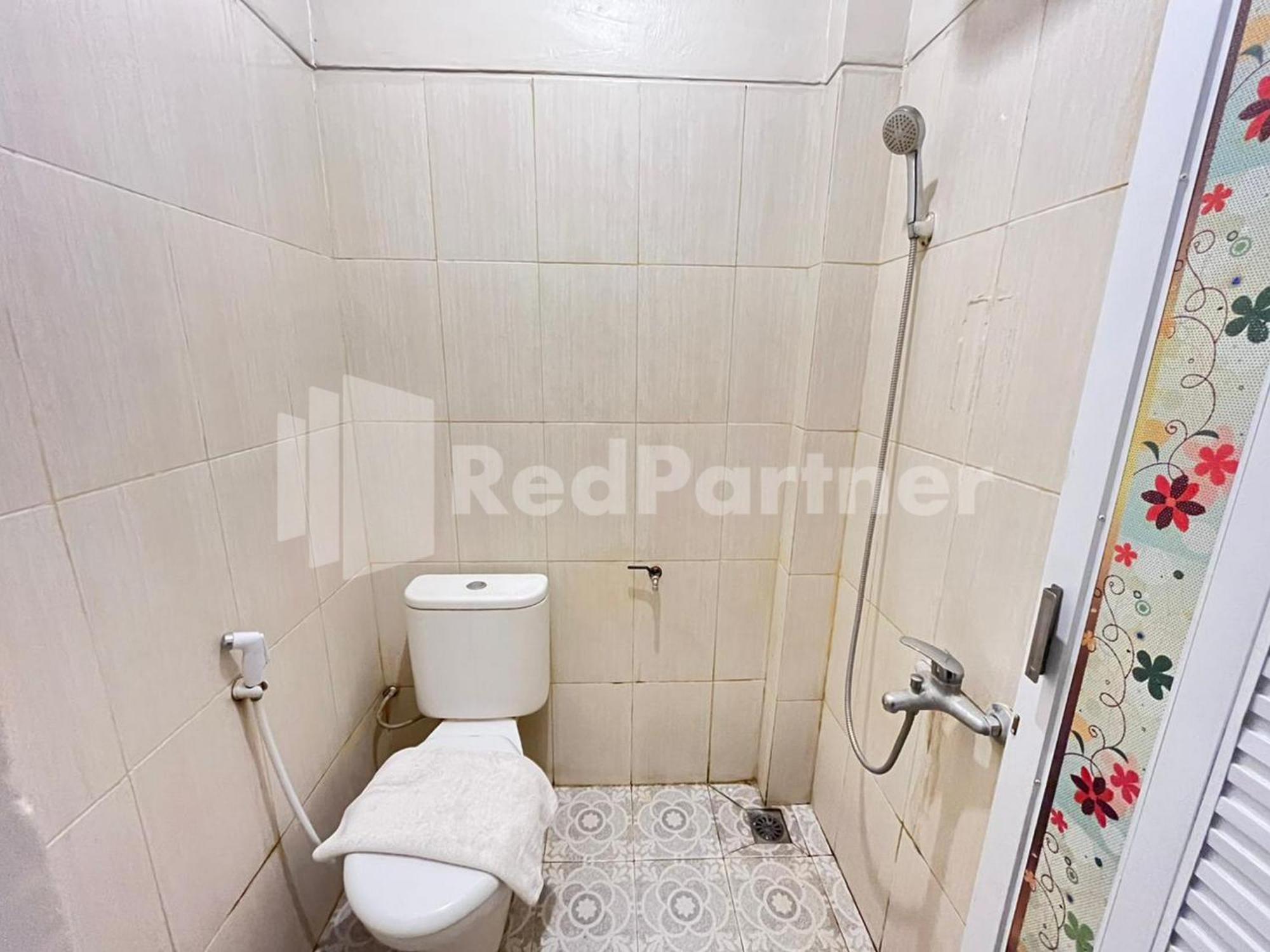 Hotel Andono Near Yia Mitra Reddoorz Temon Extérieur photo