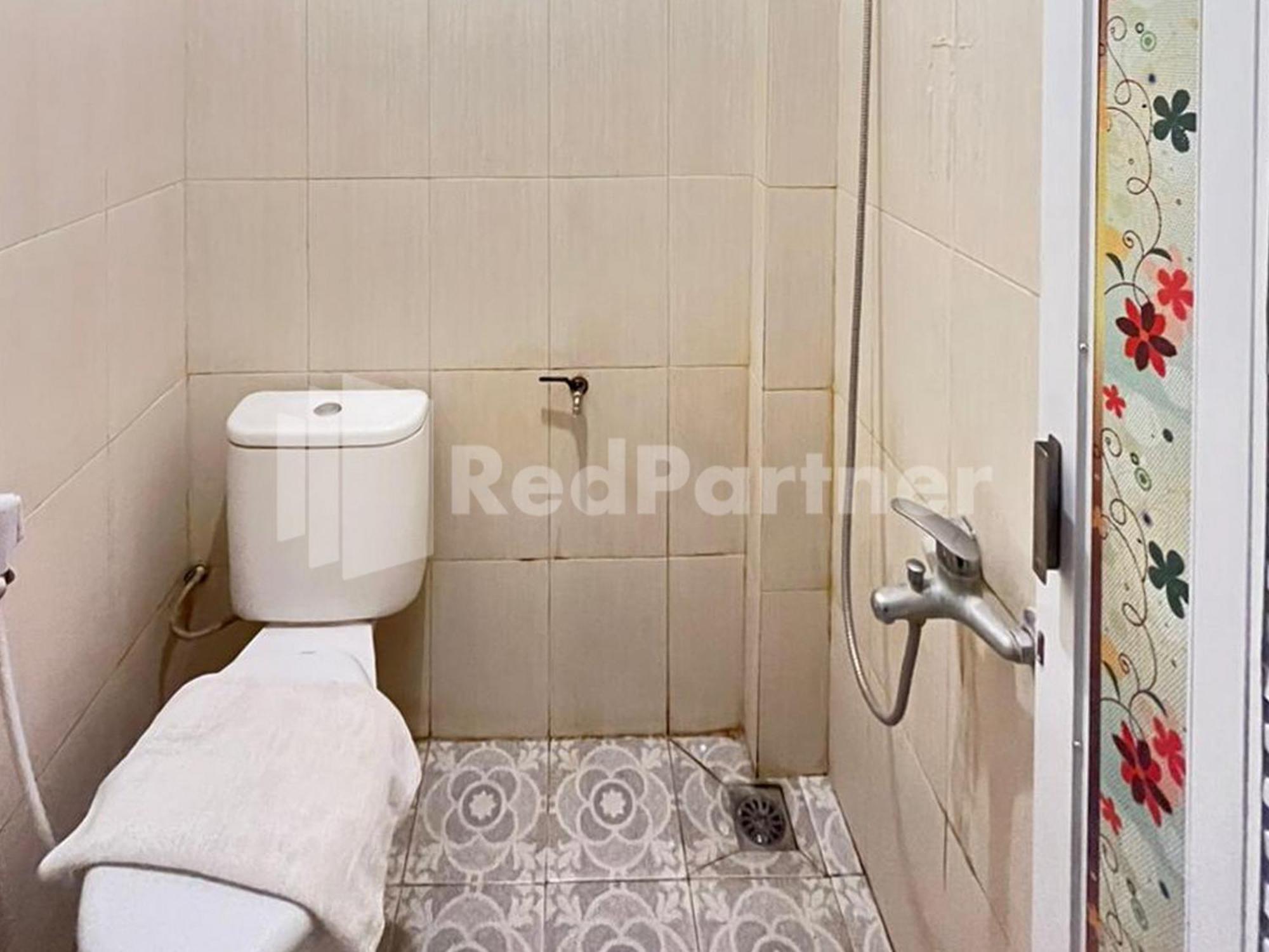 Hotel Andono Near Yia Mitra Reddoorz Temon Extérieur photo